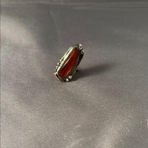 Elegant Amber and Silver Ring with Intricate Details